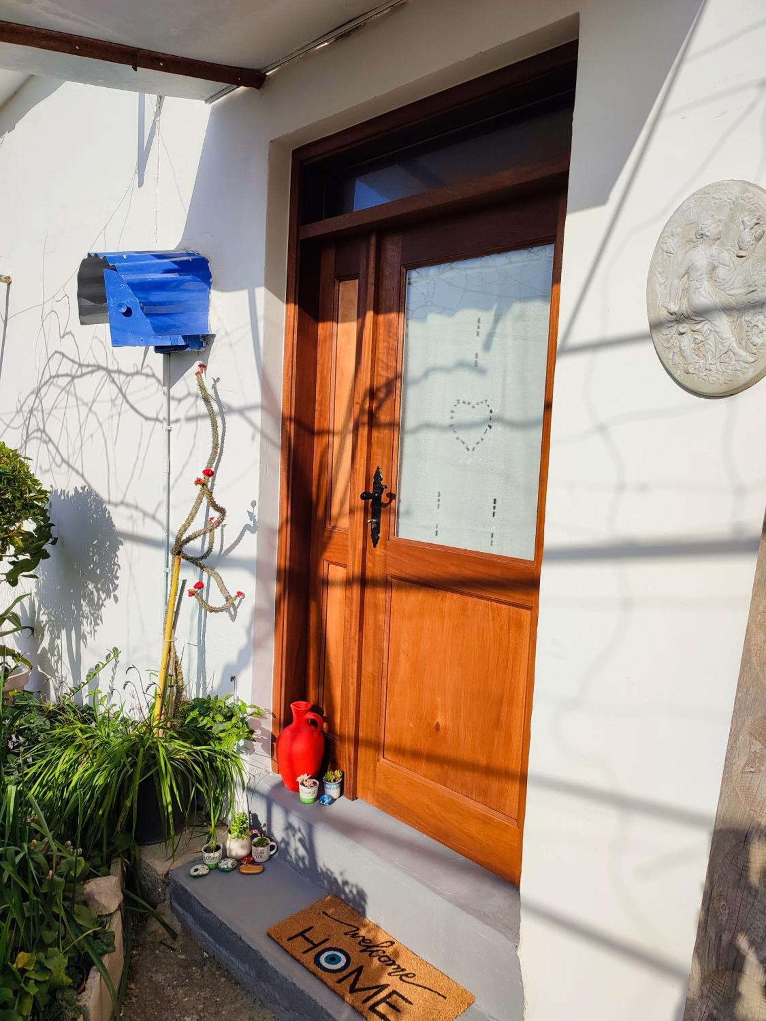Faith'S Stone House Guest House Simou ภายนอก รูปภาพ