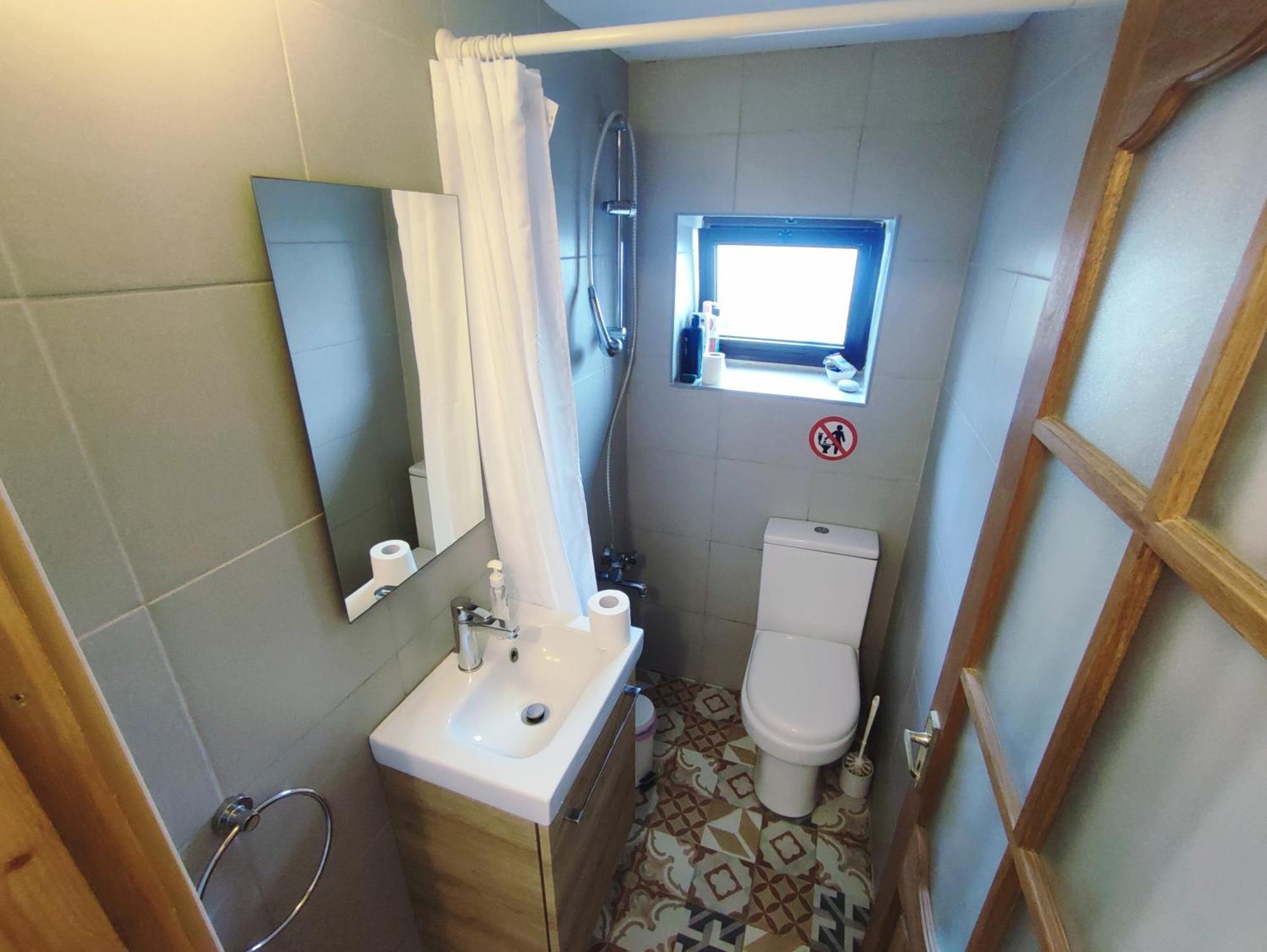 Faith'S Stone House Guest House Simou ภายนอก รูปภาพ